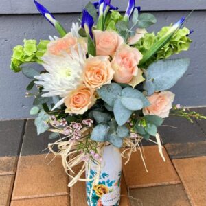 Champagne and flowers peach close up 2